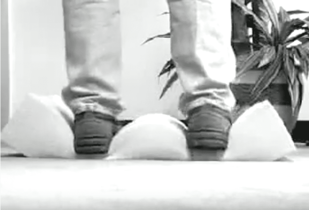 man standing on piece of foam