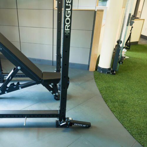 Workout equipment sitting on SmartCells physical therapy flooring