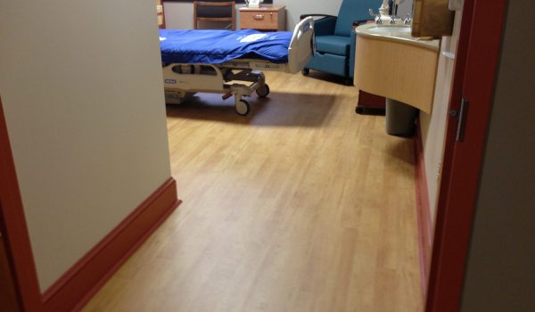 Hospital room with vinyl floor, SmartCells is used as an underlayment