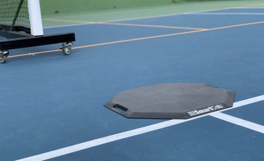 SmartCells Octagonal Mat being used for ref at a pickleball tournament