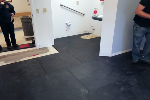 SmartCells tiles laid throughout a bathroom at a senior care center