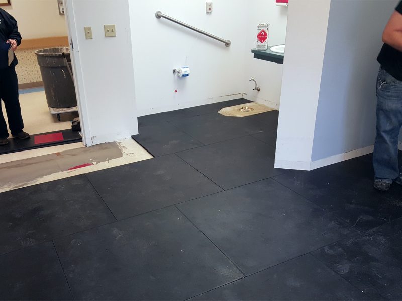 SmartCells tiles laid throughout a bathroom at a senior care center