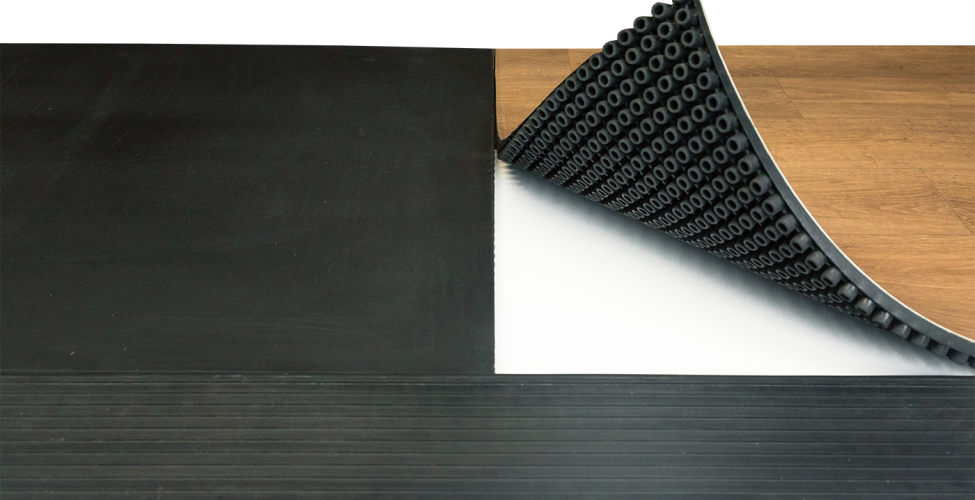 Bottom of SmartCells flooring tile being shown in fall protection configuration