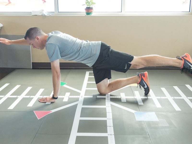 Patient doing exercises on SmartCells Physical Therapy Mat