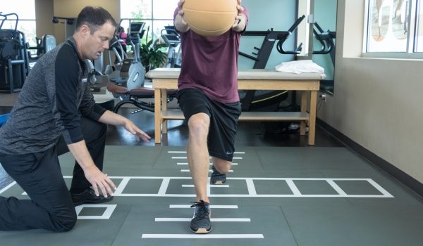 SmartCells Physical Therapy Mat Patient doing rehab exercises on the Smartcells Physical Therapy mat