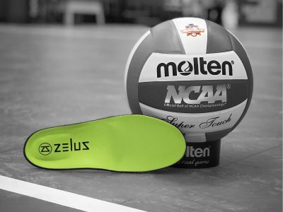 Zelus Insole sitting next to Volleyball